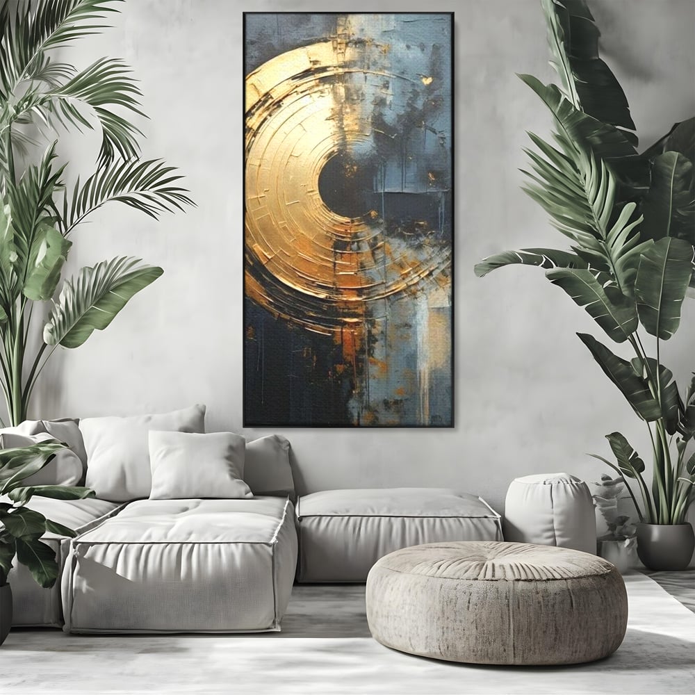 Tablou canvas cu tablou abstract cu cerc auriu, in rama de aluminiu negru, pe perete intr-un living